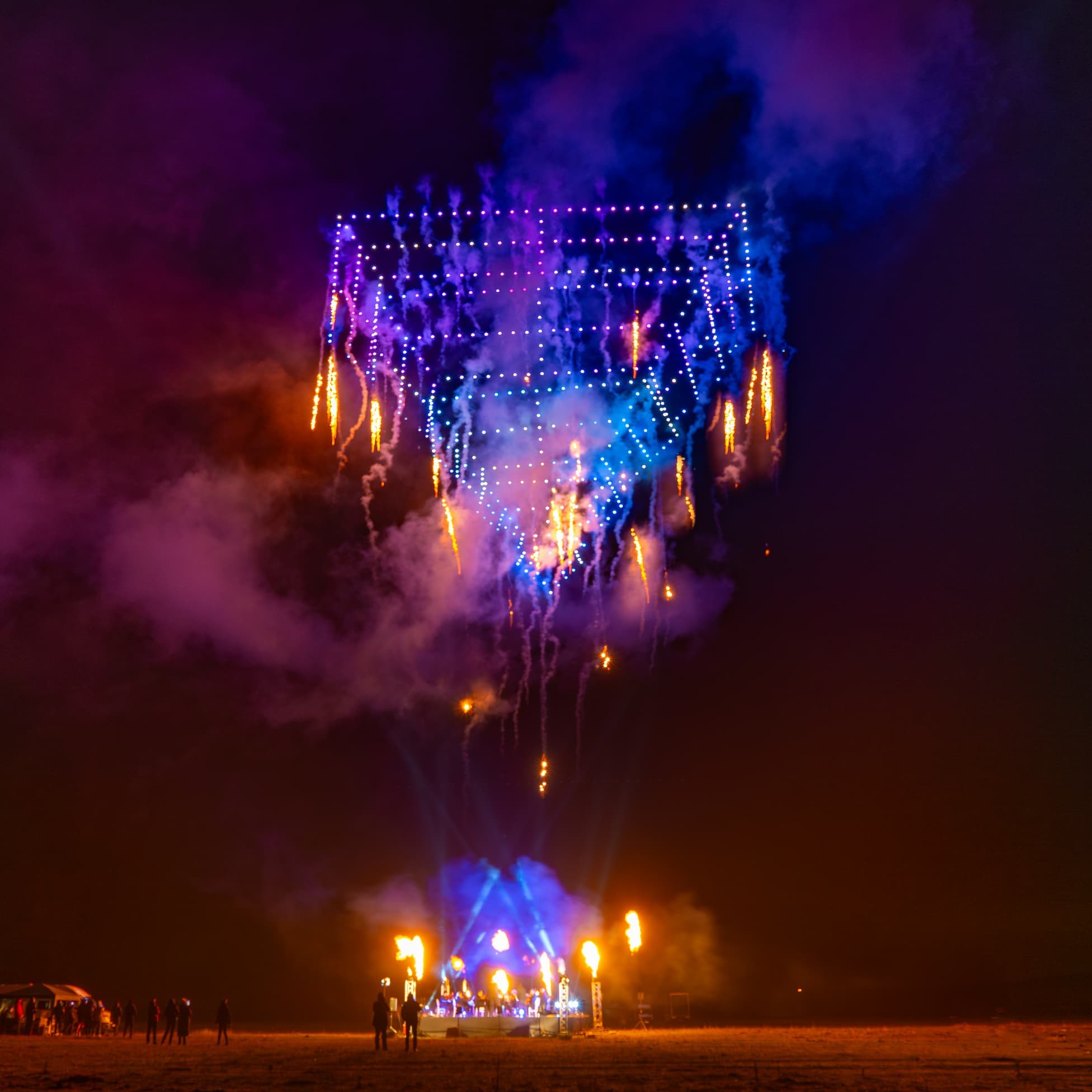 GP4 drone-and-pyrotechnic finale with firework waterfall over a crowd