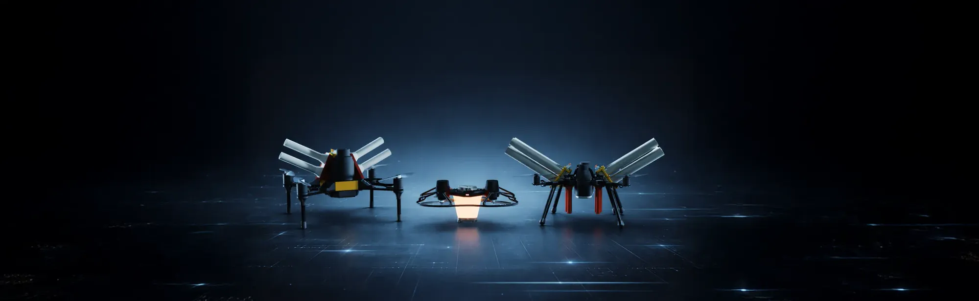 The FLYSTACK fleet — three proprietary drone platforms staged in a dark studio
