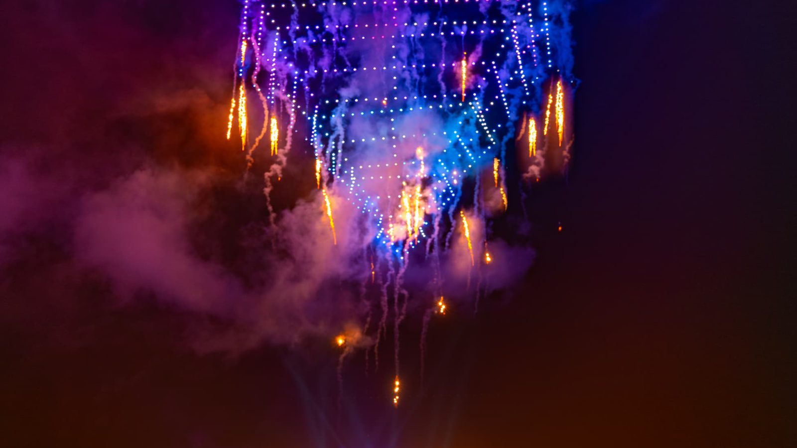 GP4 drone-and-pyrotechnic finale with firework waterfall over a crowd